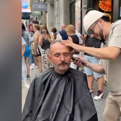 Yandel arrasa como barbero en famosa calle de España