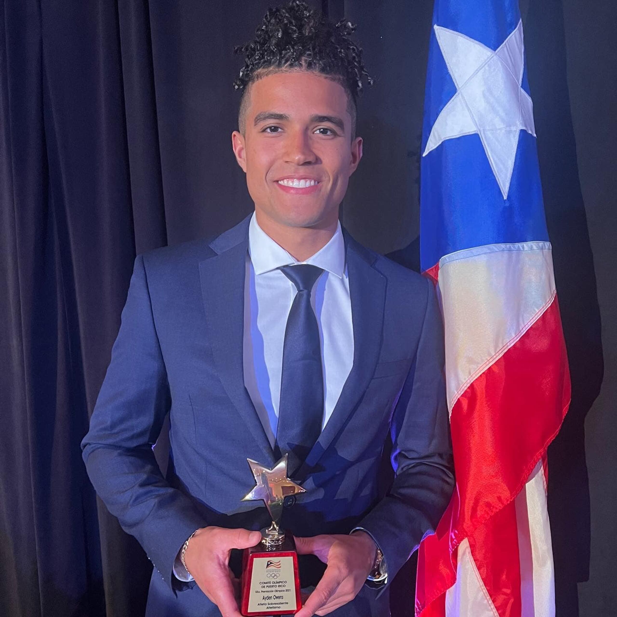 Ayden Owens Delerme, aquí en la cena olímpica, es el principal atleta que tiene Puerto Rico para el campeonato NCAA que inicia este miércoles.