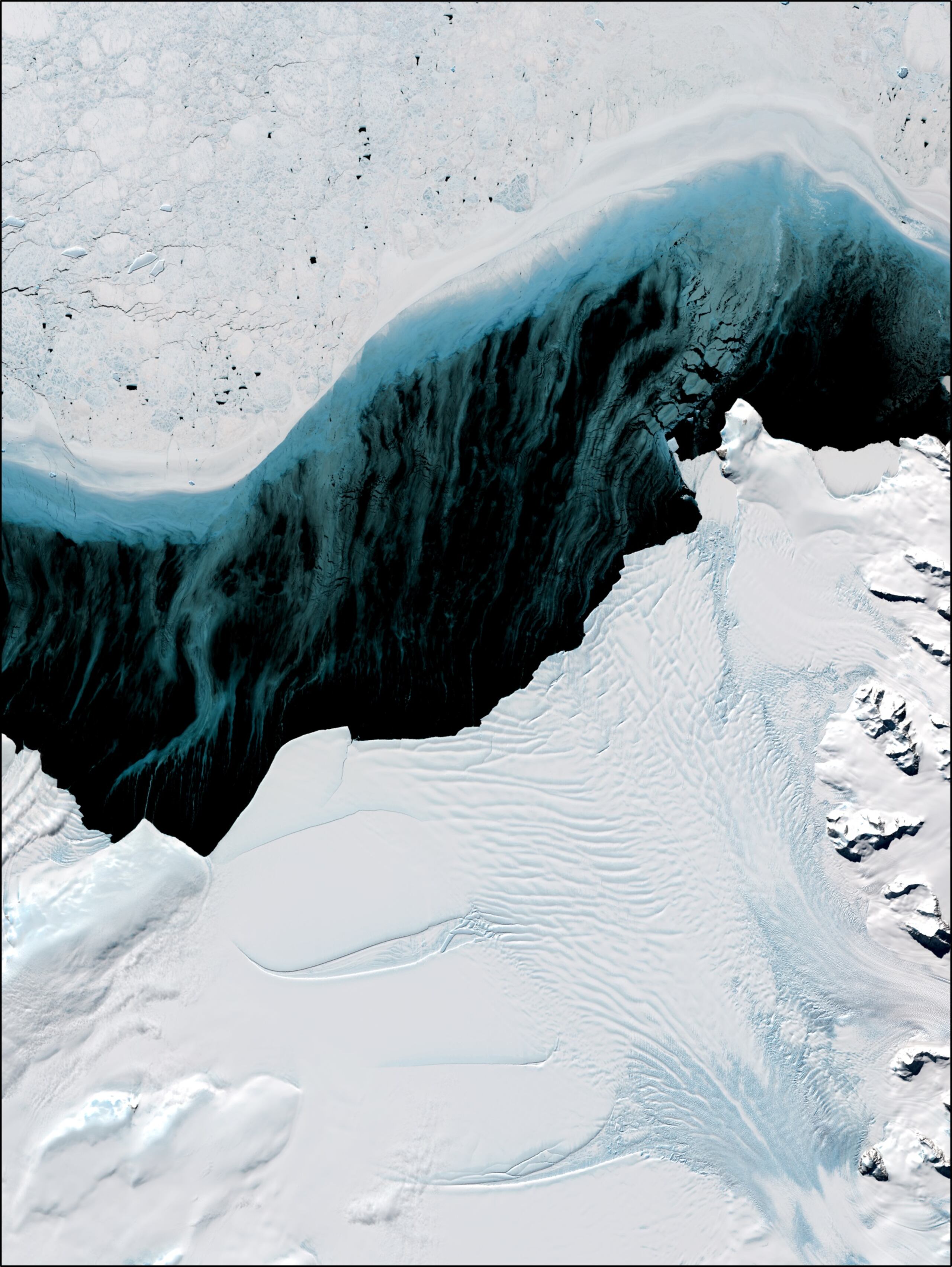 Imagen del satélite de observación terrestre Landsat 8 de la plataforma de hielo SCAR Inlet, en la Península Antártica. EFE/ ©NASA/USGS, imagen procesada por Frazer Christie, del Instituto Scott de Investigación Polar, Universidad de Cambridge.
