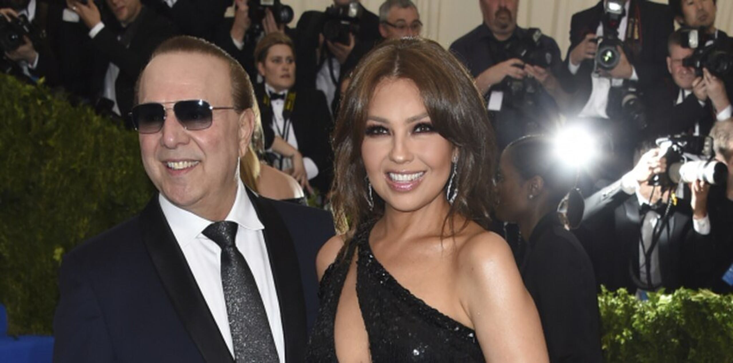 Tommy Mottola y Thalía.