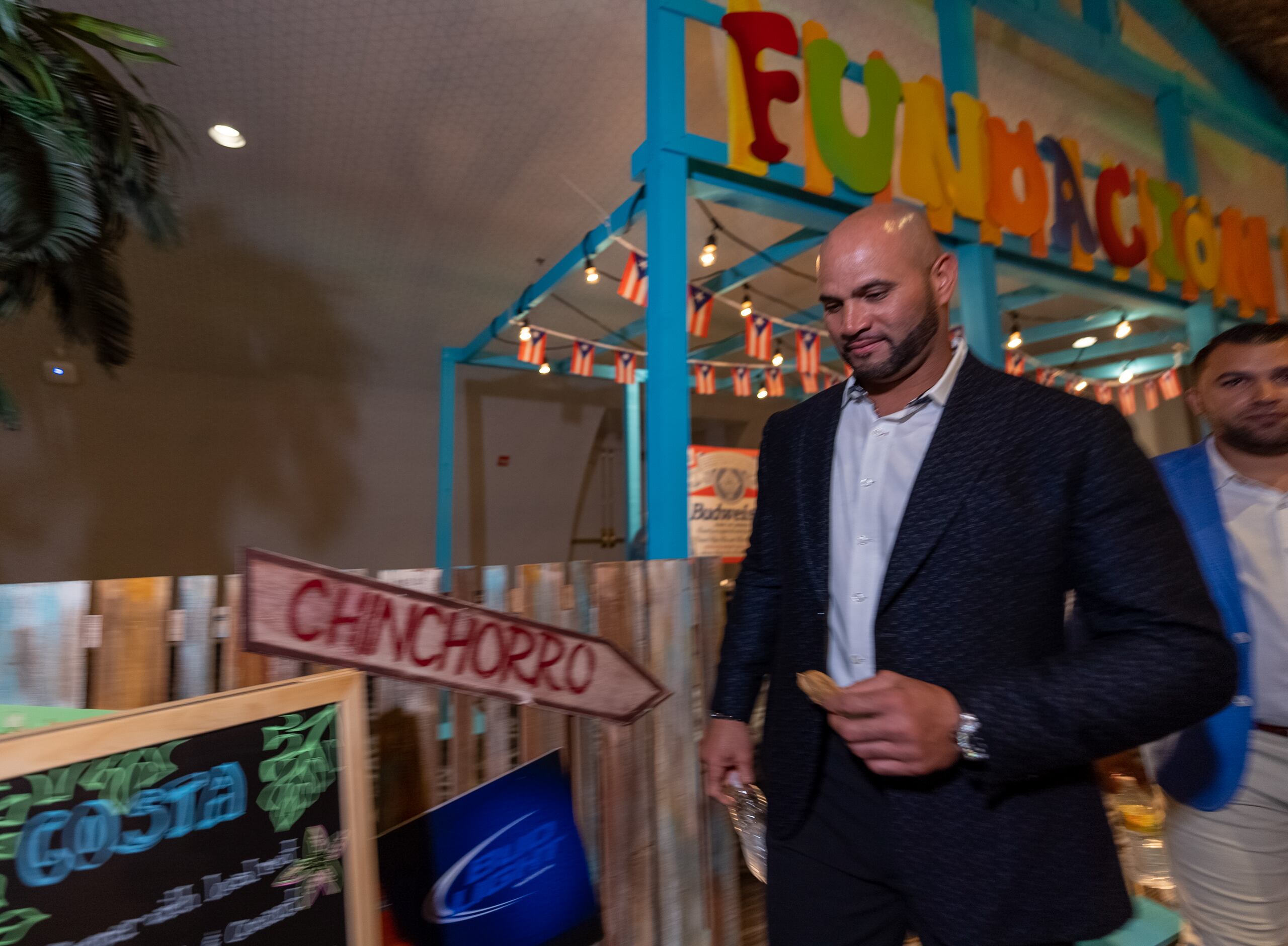 Albert Pujols aparece aquí en una foto de archivo de una actividad que realizó la Fundación de Yadier Molina el año pasado en San Luis.