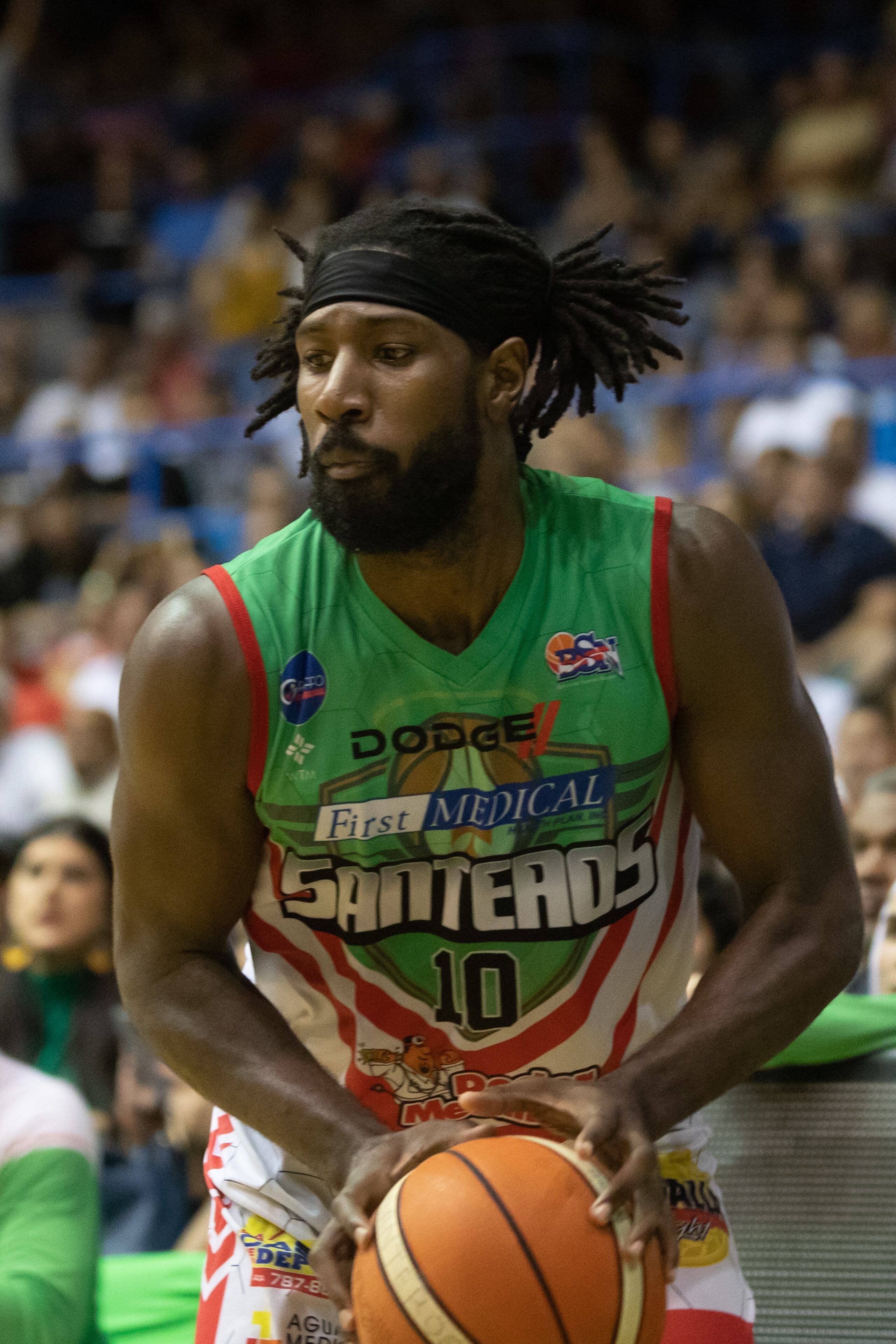 En el 2019, John Holland vio acción con los Santeros de Aguada, ahora Cariduros de Fajardo, antes de ser suspendido por la Federación de Baloncesto por alegadamente condicionar con dinero su participación con la Selección Nacional.