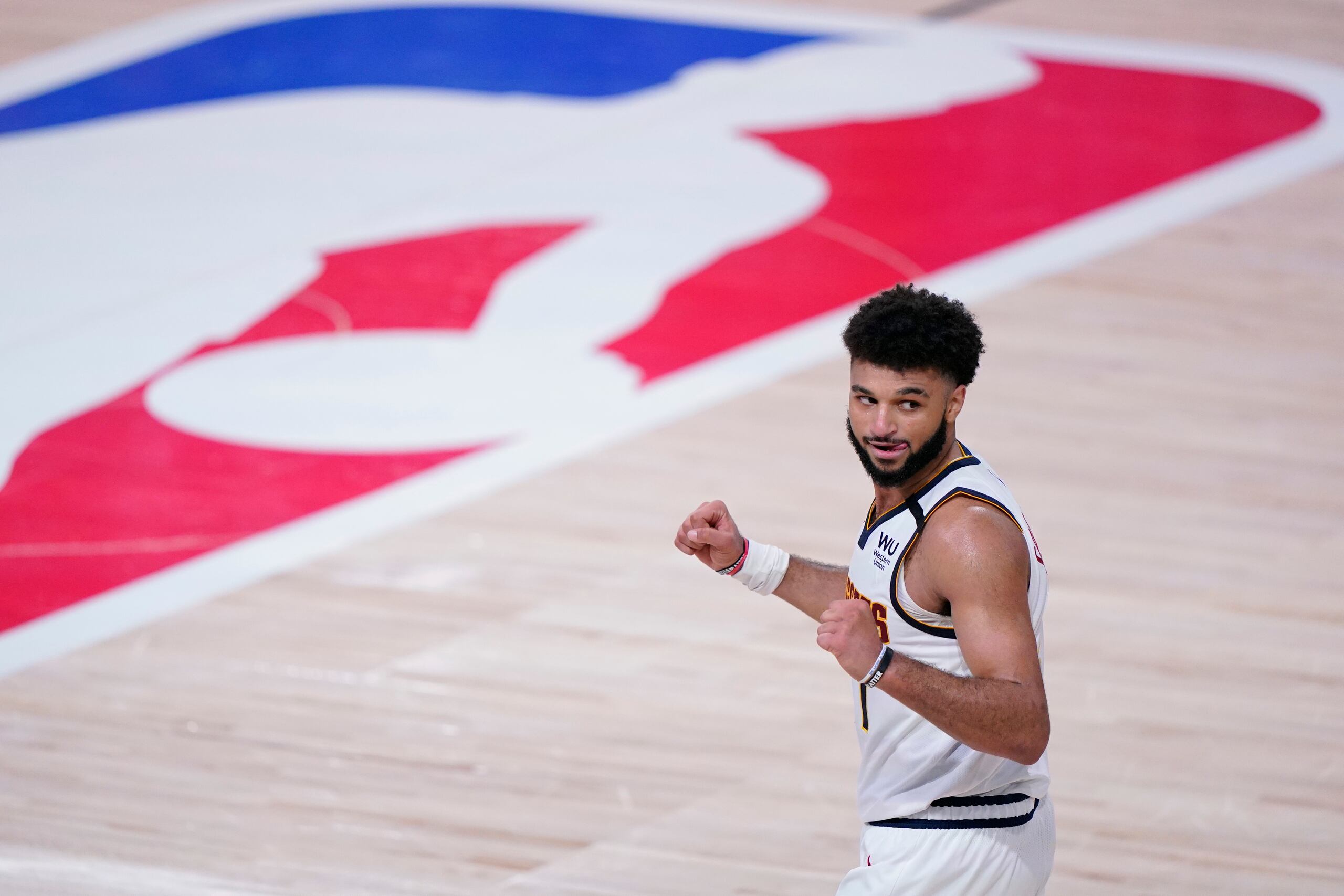 Jamal Murray, de los Nuggets, celebra el pase del equipo a la final del Oeste tras derrotar a los Clippers en un séptimo juego decisivo.