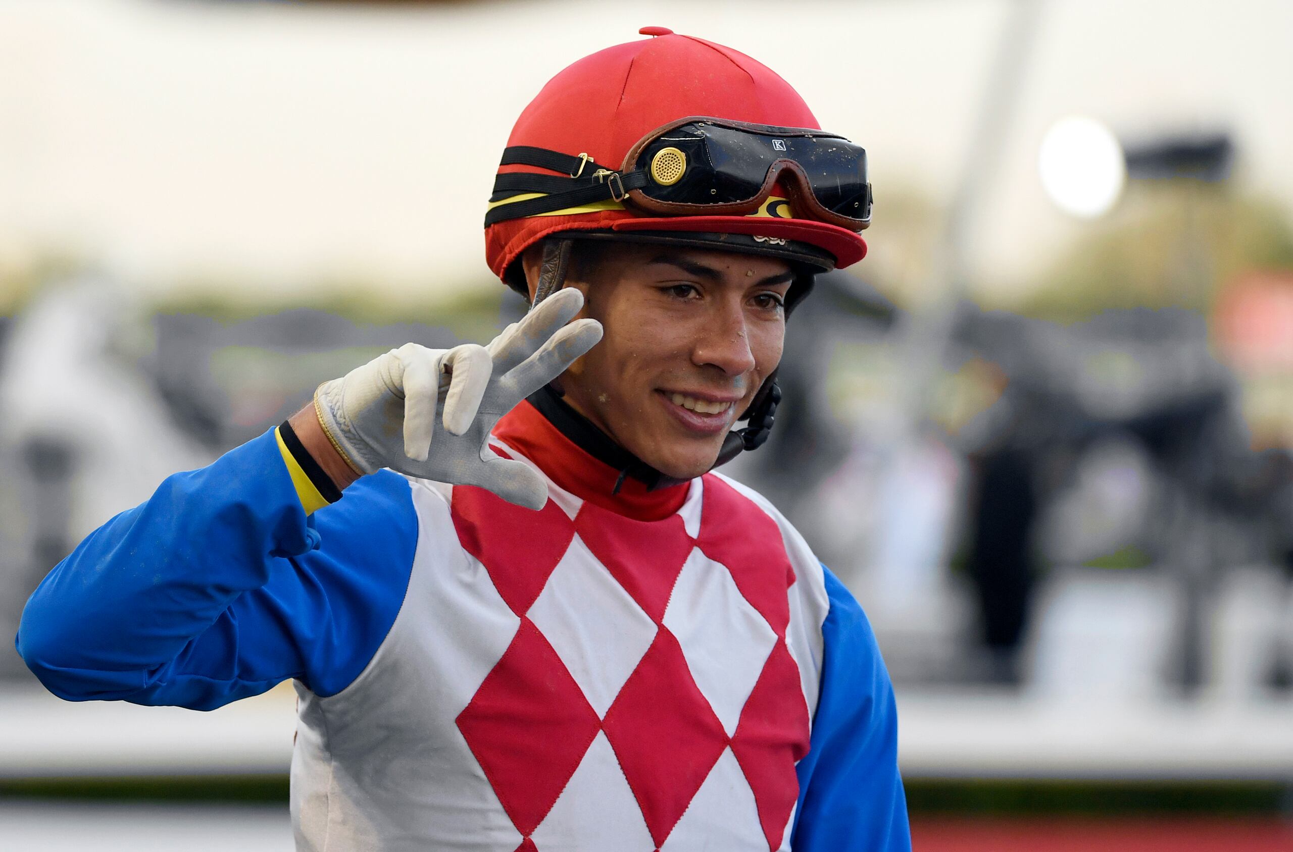 Jockey Jose Ortiz reacts after winning with Plus Que Parfait the $2.5 million Group 2 UAE Derby over 1900m in Dubai, United Arab Emirates, Saturday, March 30, 2019. (AP Photo/Martin Dokoupil)