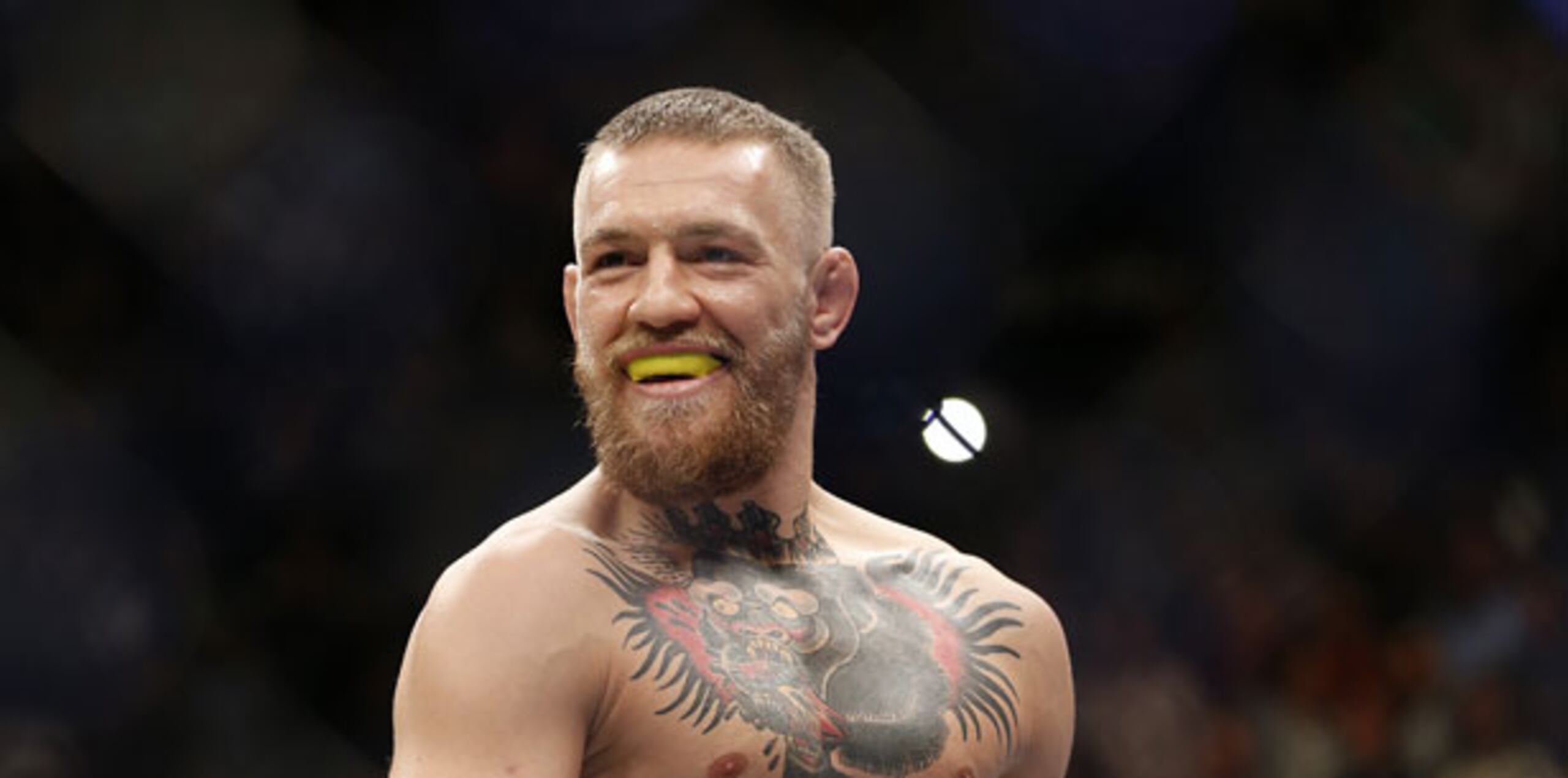 McGregor salió de allí con su ego algo lastimado por el revés vía sumisión en el segundo asalto pero con su cartera llena. (AP Photo/Eric Jamison)
