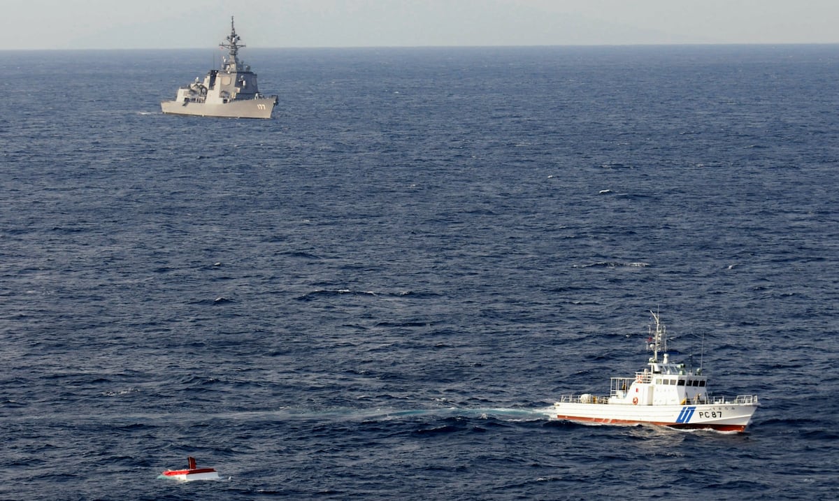 Woman rescued after 37 hours after being swept out of sea in Japan